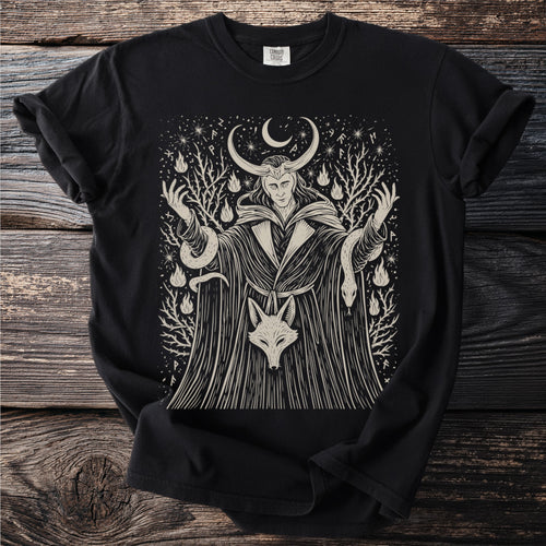 Black t-shirt with a tan linocut of Loki surrounded by snakes, flames, and runes.