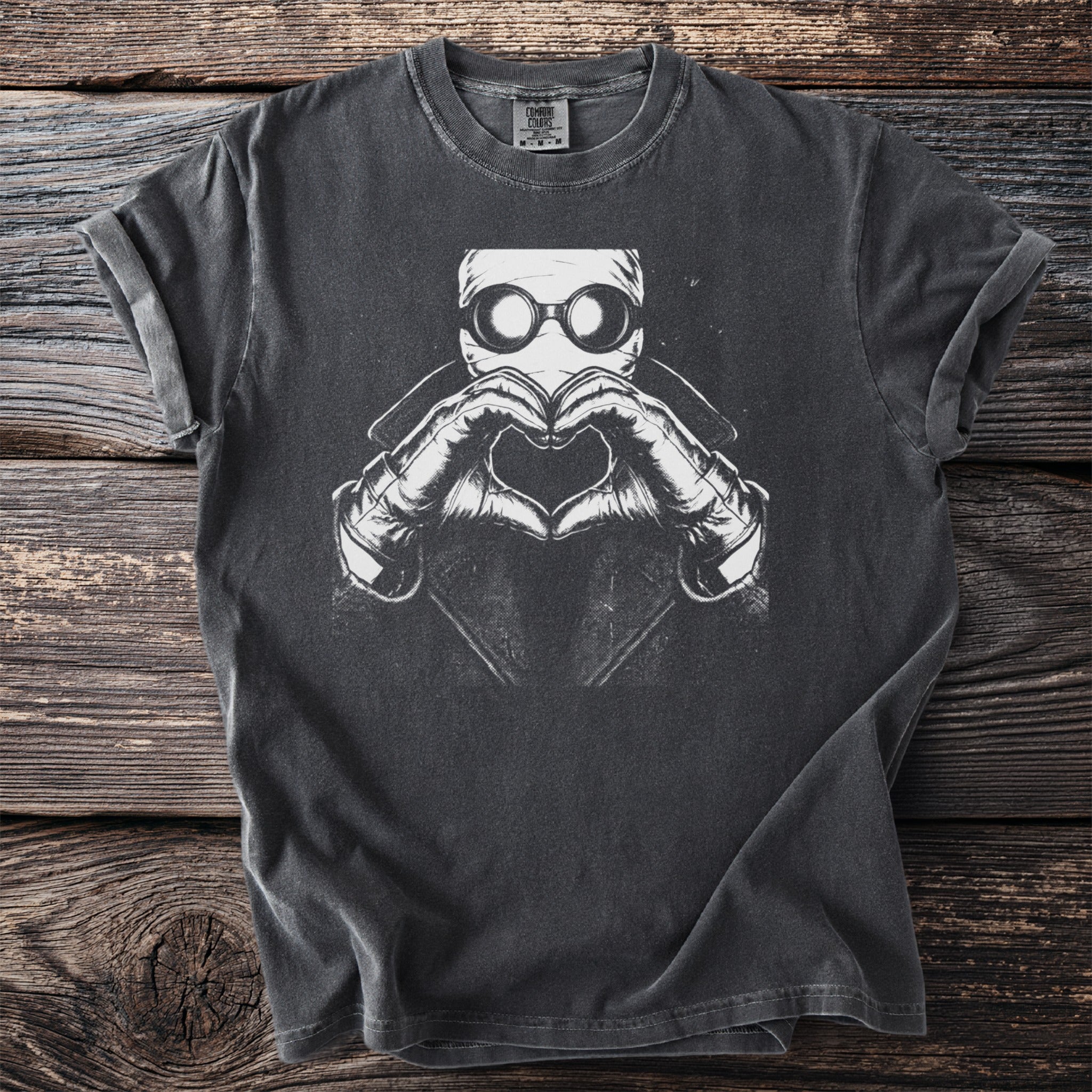 Dark grey t-shirt with white graphic of The Invisible Man forming heart with hands.