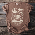 Brown t-shirt featuring a scientific illustration of deep-sea creatures and the text "The Abyss".