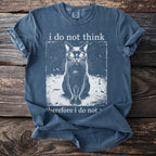 Blue t-shirt with graphic of a cat and text "i do not think therefore i do not".
