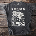 Dark gray t-shirt with "Slime Mold" graphic and "No Brain Still a Plan" text.