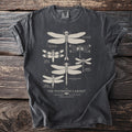 Dark grey t-shirt with scientific illustrations of various dragonflies titled "The Waterside Cabinet".