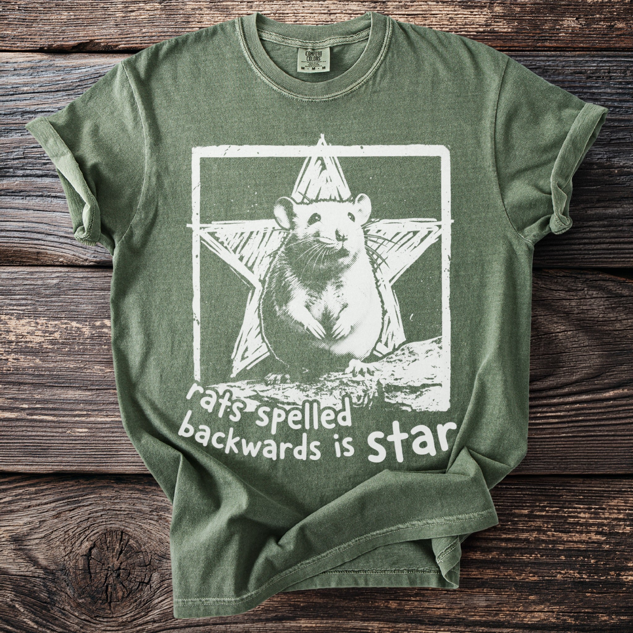 Olive green t-shirt with white graphic of rat, star, and text "rats spelled backwards is star".