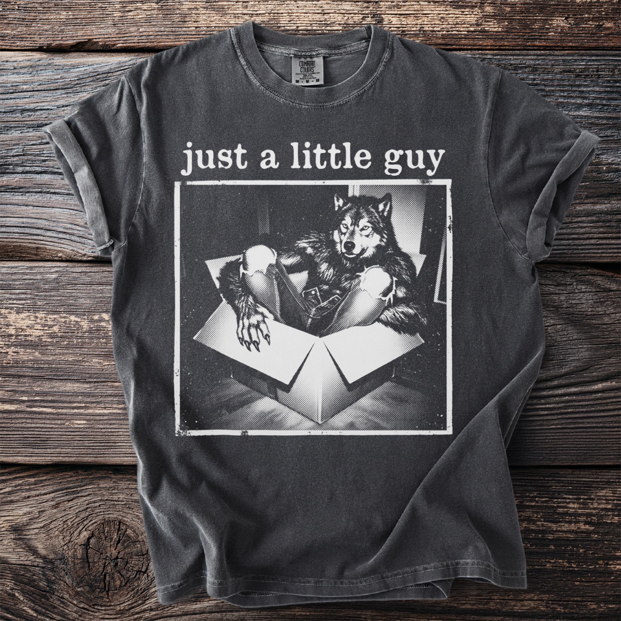 Charcoal t-shirt with black and white graphic of a werewolf in a box and text "just a little guy".