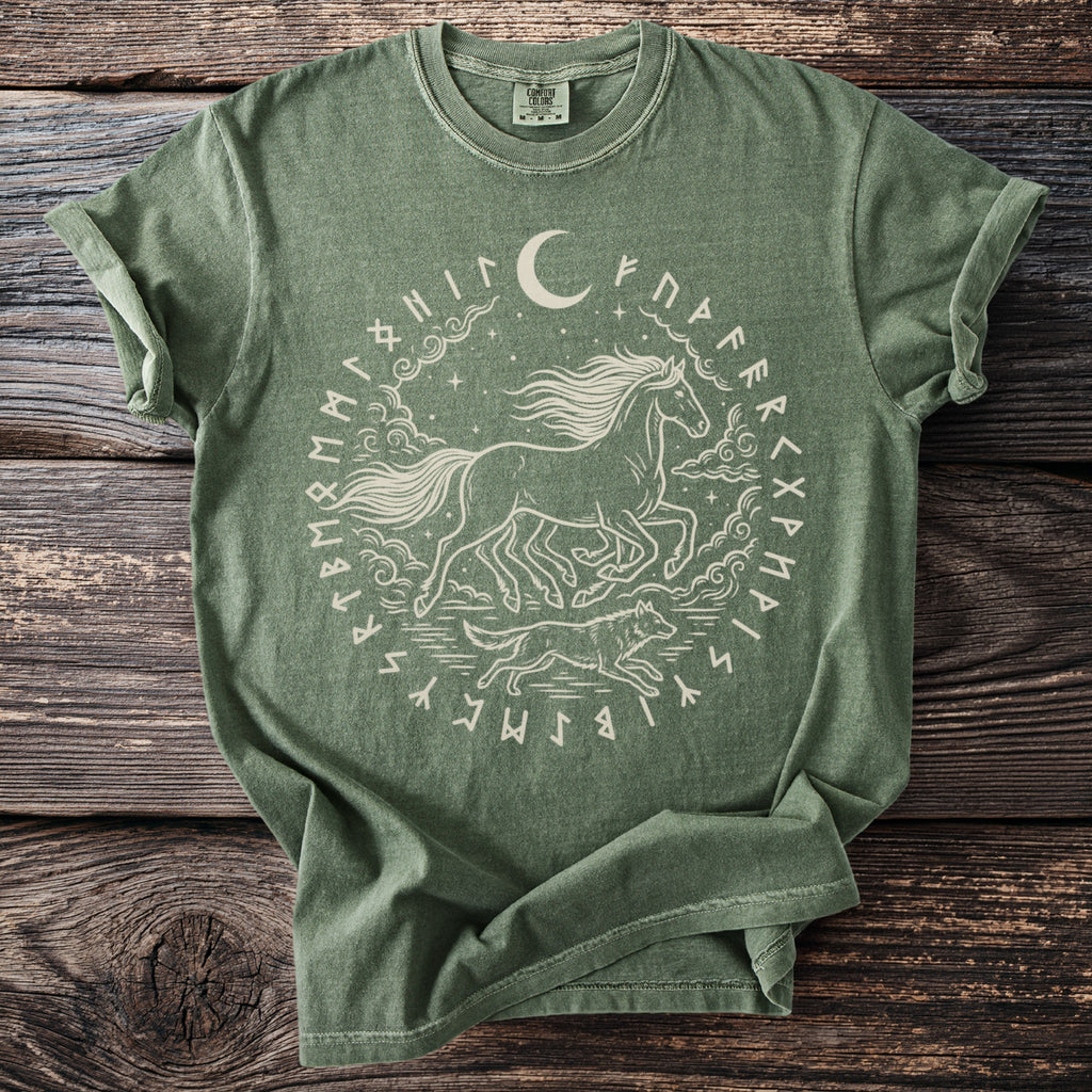 Green t-shirt with a running horse, wolf, moon, and runes in a circular design.