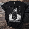 Black t-shirt with a gothic cat illustration and text "i do not think therefore i do not a".