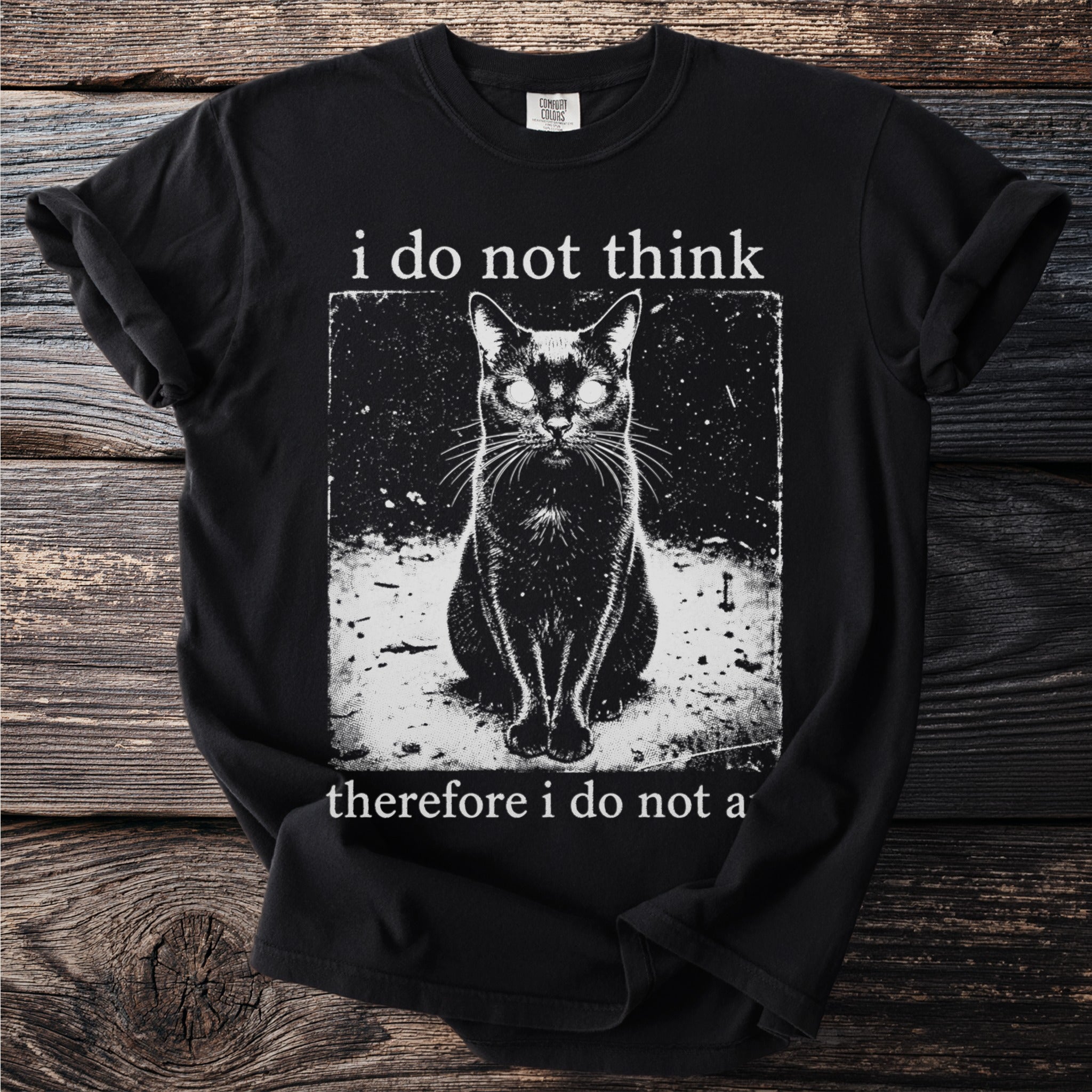 Black t-shirt with a gothic cat illustration and text "i do not think therefore i do not a".