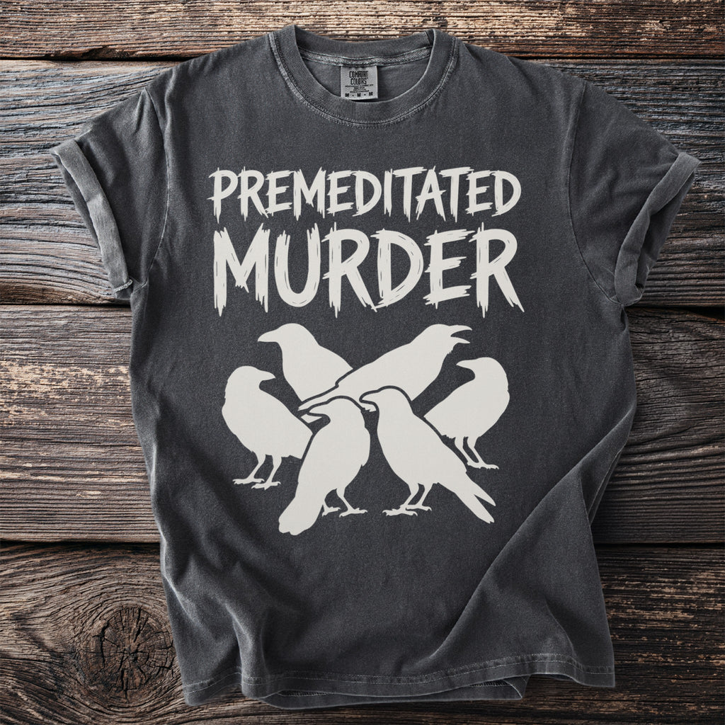 Dark grey t-shirt with "PREMEDITATED MURDER" text and white bird silhouettes.