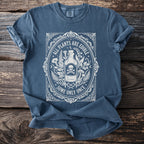 Blue t-shirt with white graphic: "All Plants Are Edible Some Only Once".