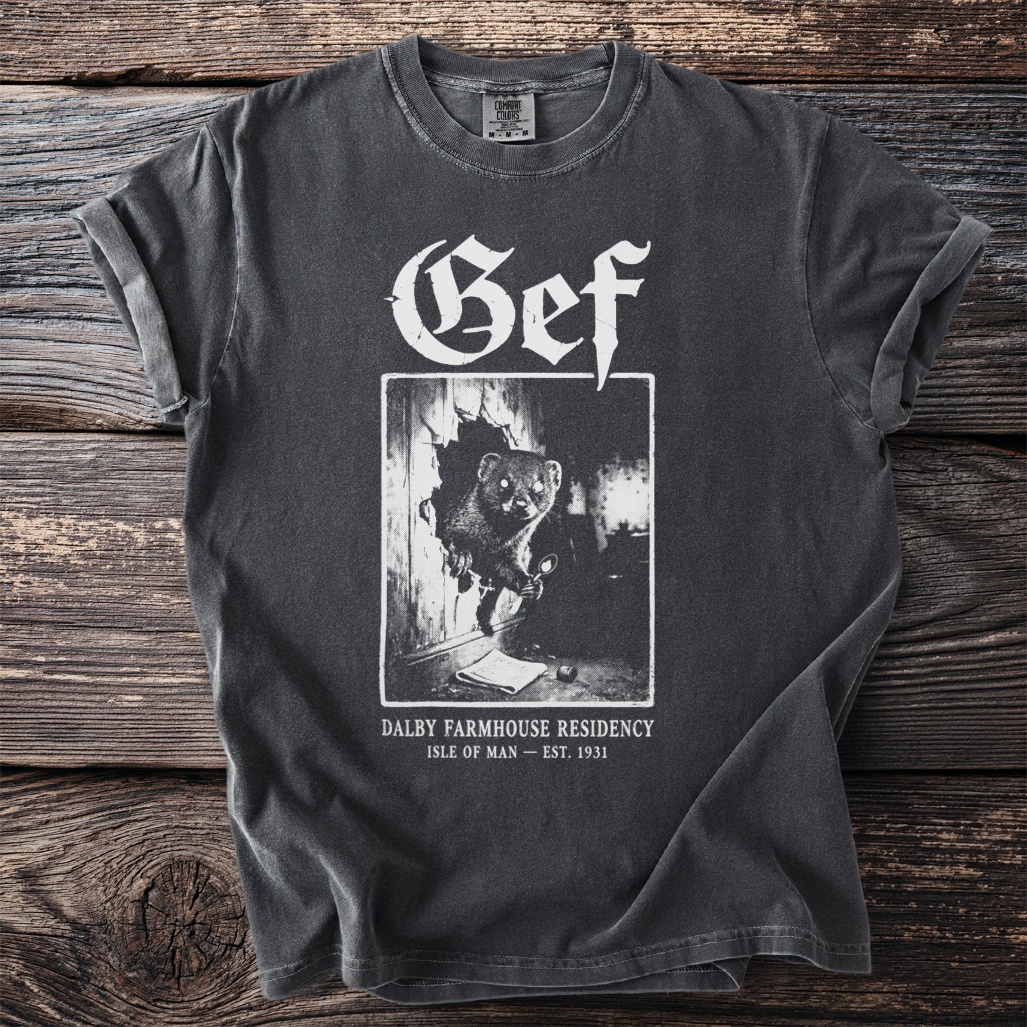 Dark grey t-shirt with "Gef" and a vintage image of a stoat on it.