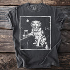 T-shirt with a graphic print of a golden retriever sitting at a bar with a beer.