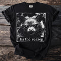 Black t-shirt with grunge style graphic of a bat face and text "tis the season".