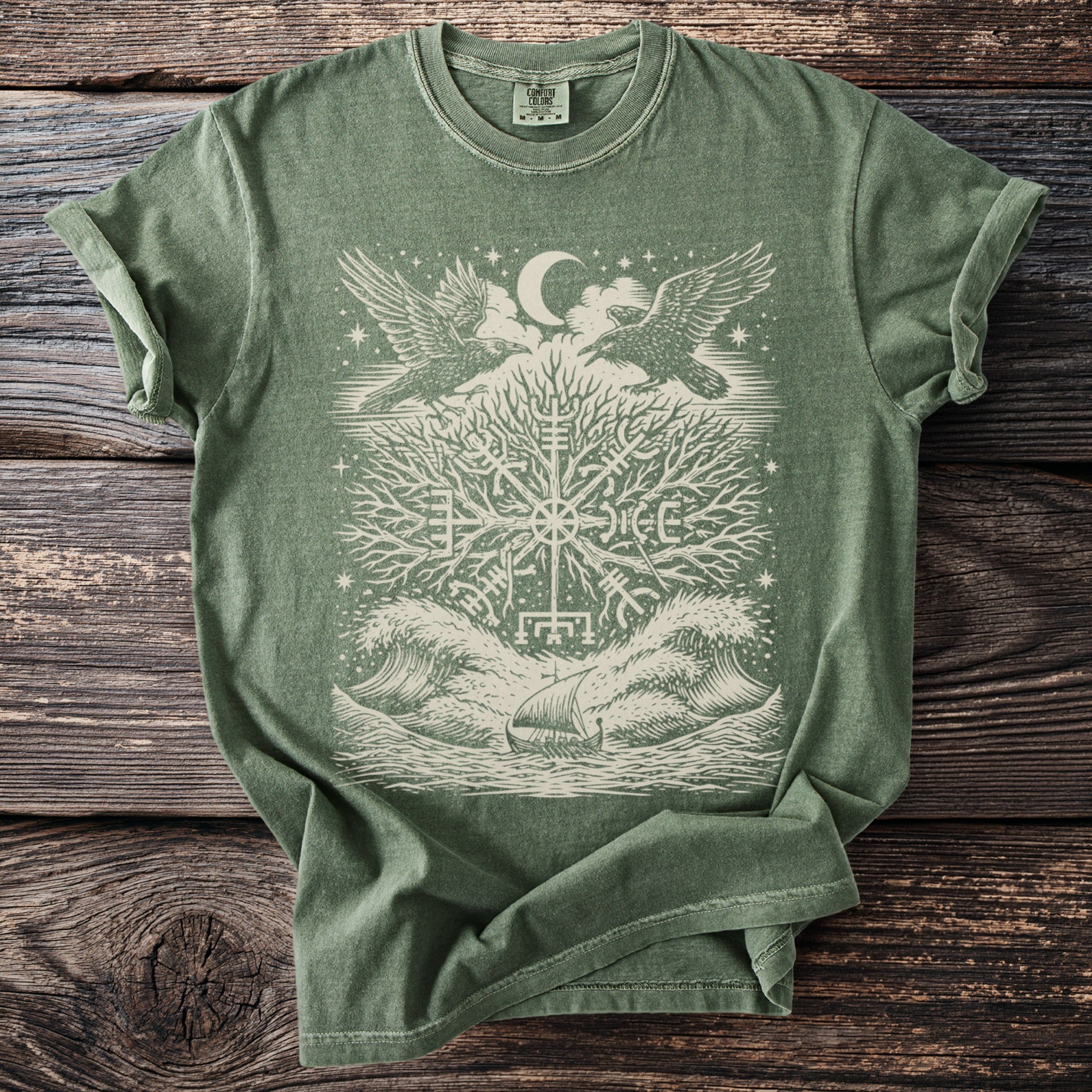 Green t-shirt with Norse tree and Viking ship graphic, two eagles and moon.