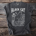 Black cat sitting on a wall with vines, moon, and butterfly, text "BLACK CAT".