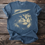 Blue t-shirt with a sketch of a cat's face wearing a hat.