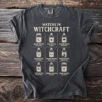 T-shirt graphic with "Waters in Witchcraft" and nine jar illustrations with descriptive labels.