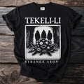 Black t-shirt with "TEKELI-LI STRANGE AEON" and creature with eyes design.