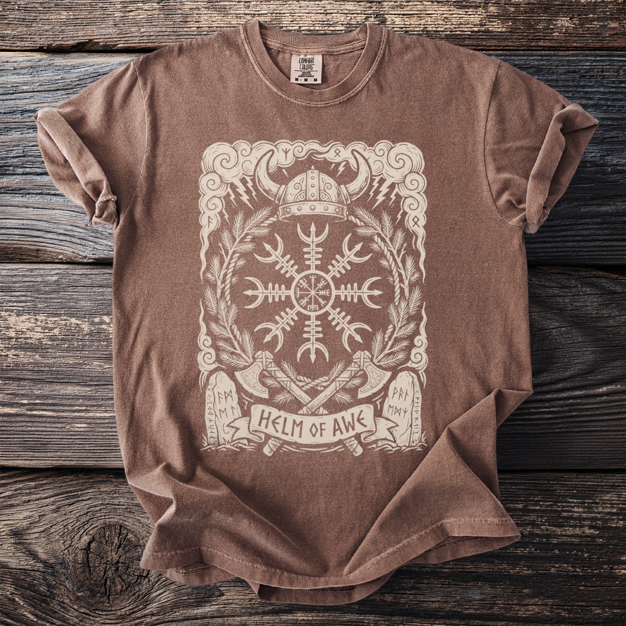 Brown t-shirt with a white Helm of Awe graphic, Viking helmet, axes, and runes.