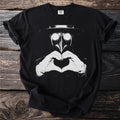 Black t-shirt with a plague doctor illustration making a heart shape with hands.