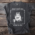 T-shirt with a capybara smoking and holding a mug with text "don't tell me what to do".
