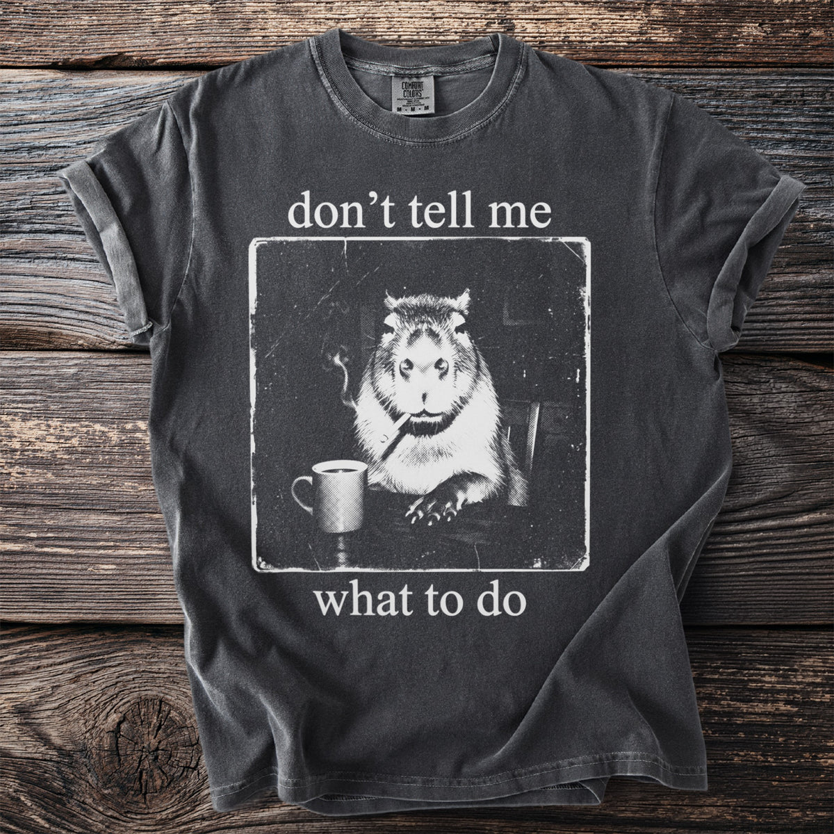 T-shirt with a capybara smoking and holding a mug with text "don't tell me what to do".