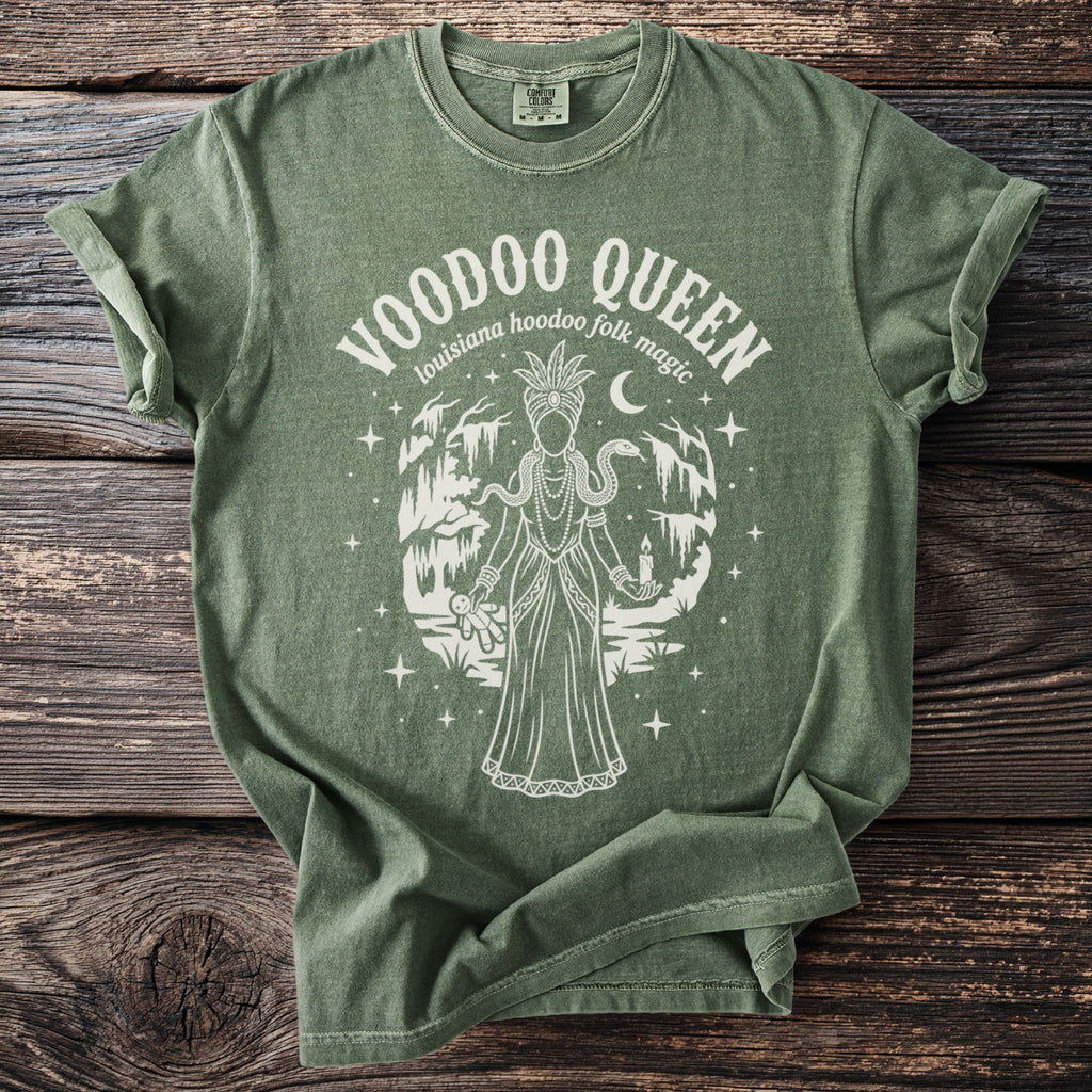 Green t-shirt with "Voodoo Queen Louisiana Hoodoo Folk Magic" graphic.