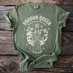 Green t-shirt with "Voodoo Queen Louisiana Hoodoo Folk Magic" graphic.