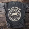 Dark gray t-shirt with "WAYFINDER" and a graphic of a running hare within a moon phase mandala.