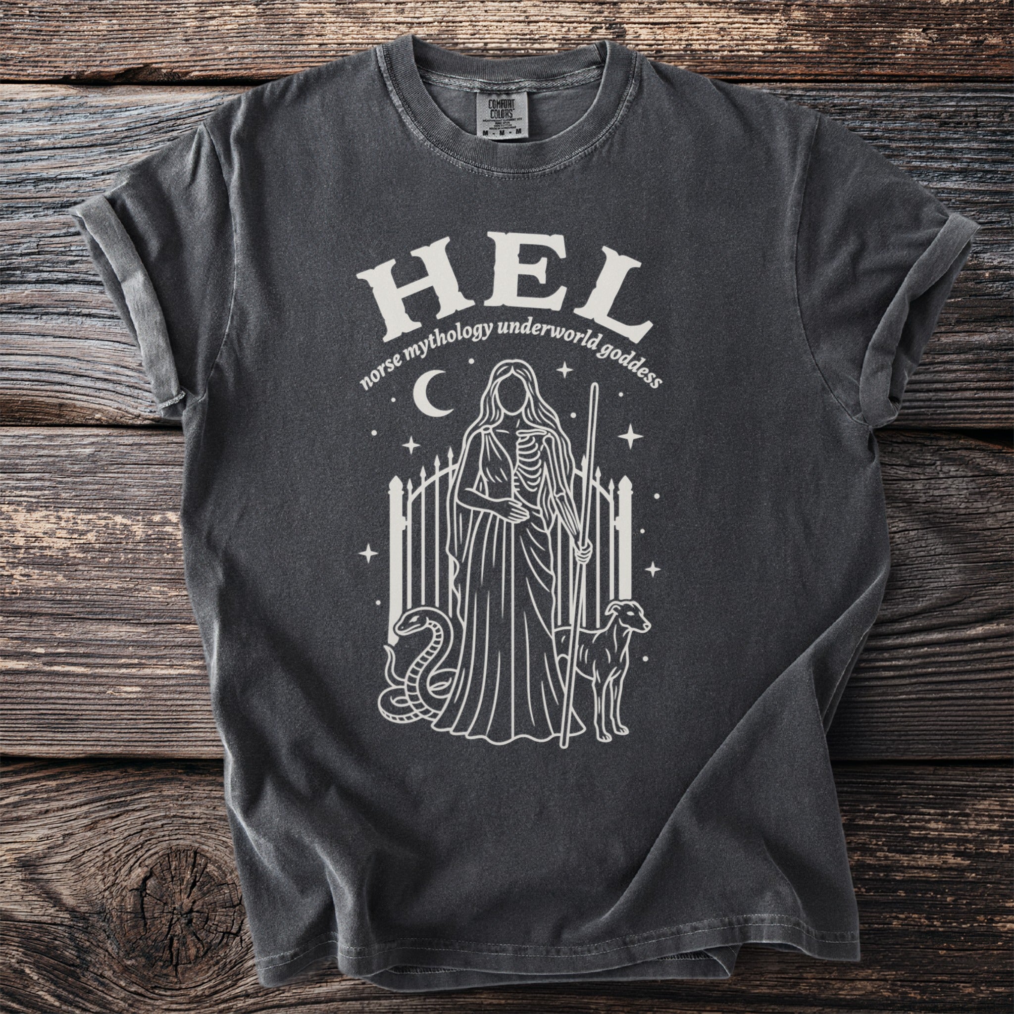 Charcoal t-shirt with "Hel norse mythology underworld goddess" text and graphic.