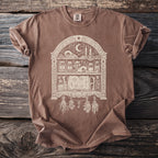Brown t-shirt with a white graphic of a witch's apothecary shelf.