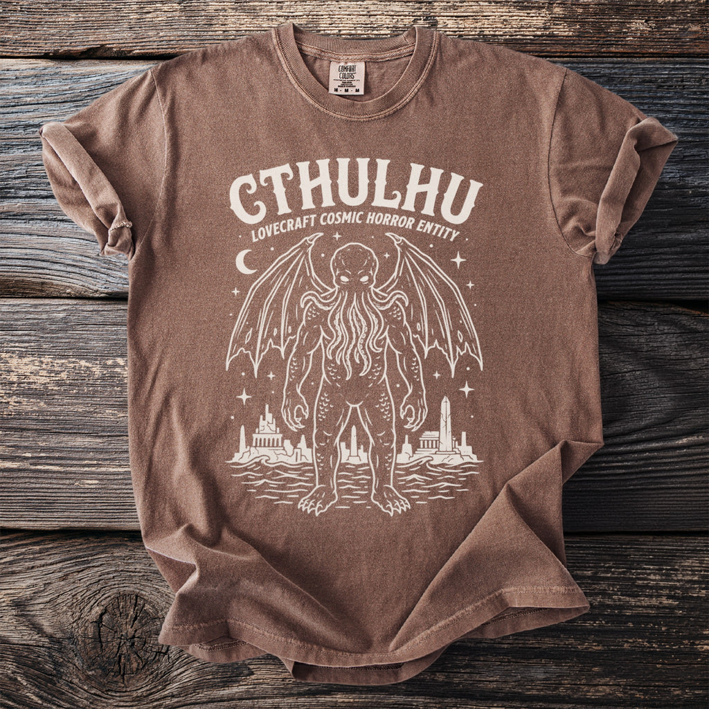 Brown t-shirt with white Cthulhu graphic and text: Lovecraft Cosmic Horror Entity.