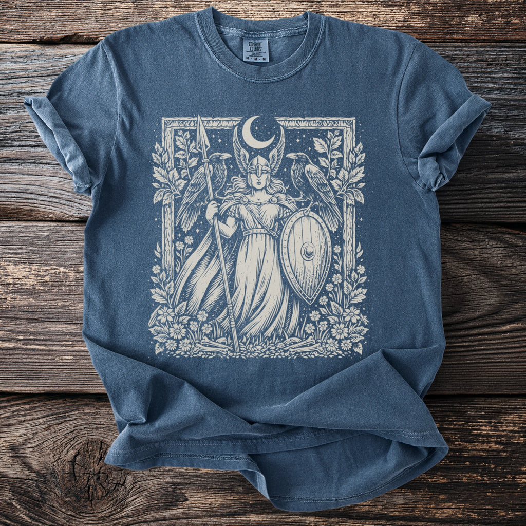 Blue t-shirt with a vintage-style print of a Valkyrie, shield, spear, and ravens.