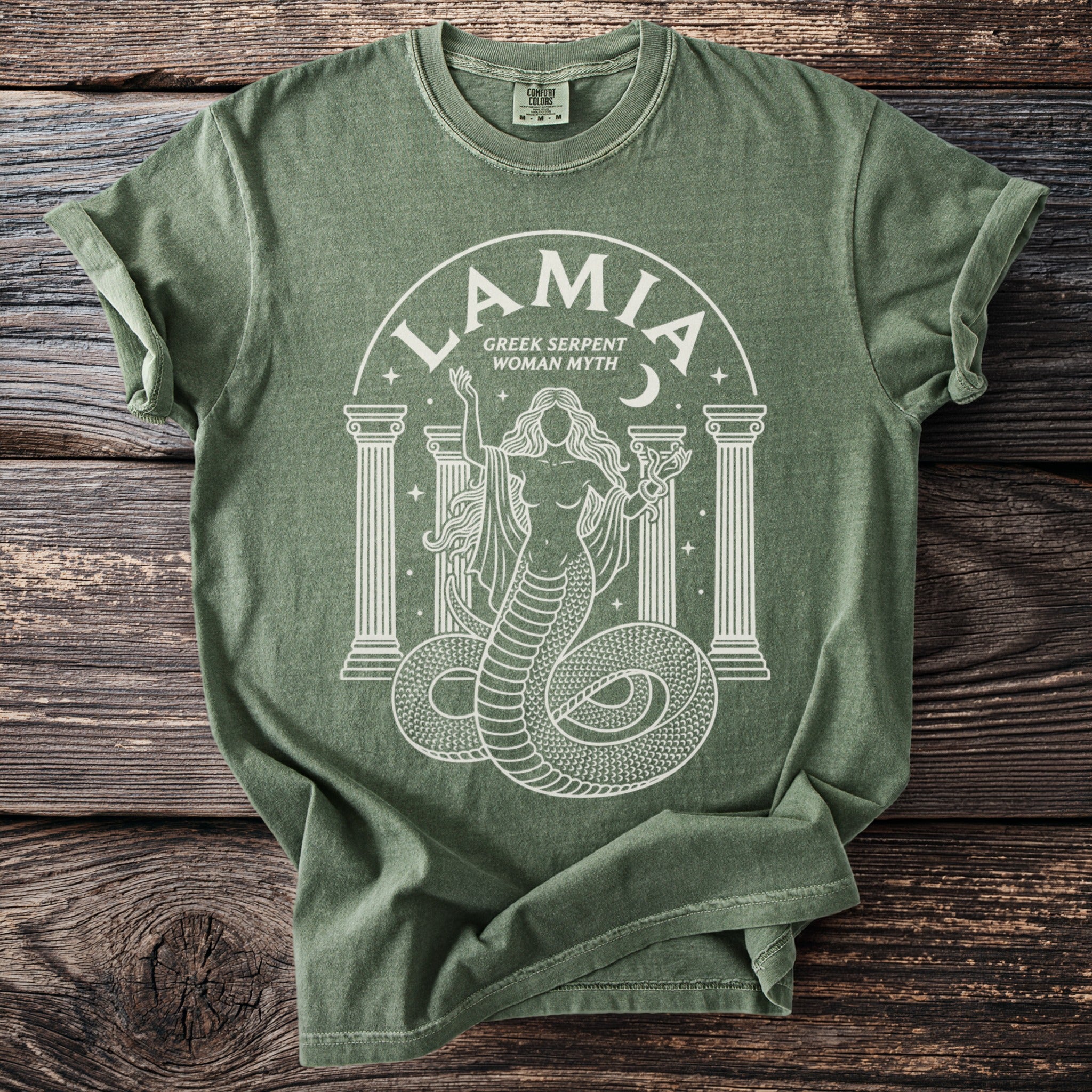 Green t-shirt with white graphic of Lamia, Greek serpent woman myth, and columns.