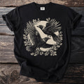 Black t-shirt with three cedar waxwings crossing a winterberry wreath.