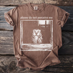 Brown t-shirt with a distressed graphic of an owl and text "please do not perceive me".