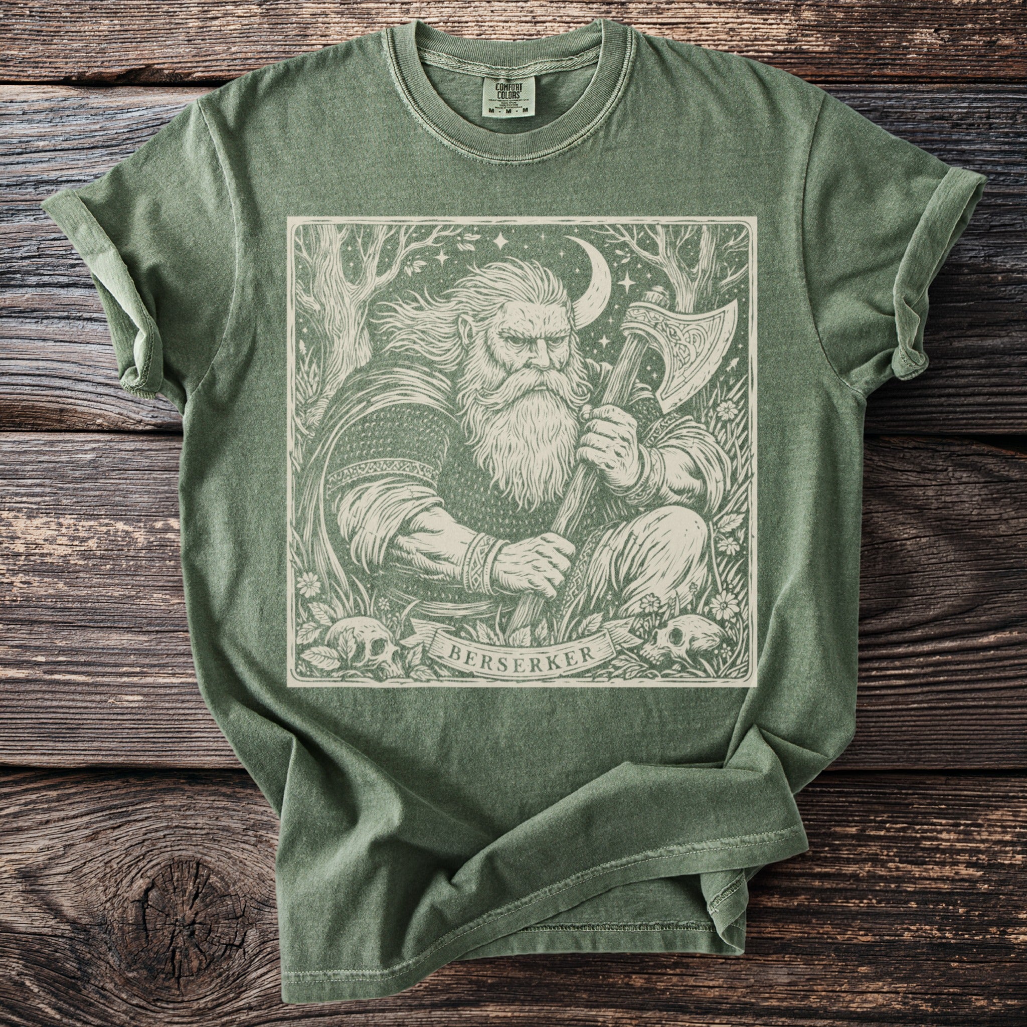 Green t-shirt with a framed illustration of a bearded berserker holding an axe and the word "BERSERKER".