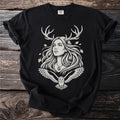 Black t-shirt with a cream linocut design of a woman with antlers and an owl.