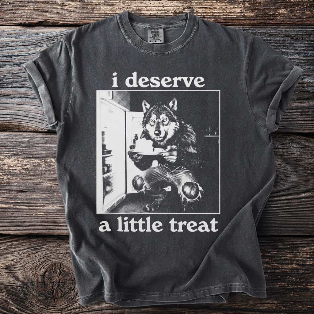 Wolf in front of an open refrigerator holding a cake, text reads "i deserve a little treat".