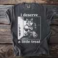 Wolf in front of an open refrigerator holding a cake, text reads "i deserve a little treat".