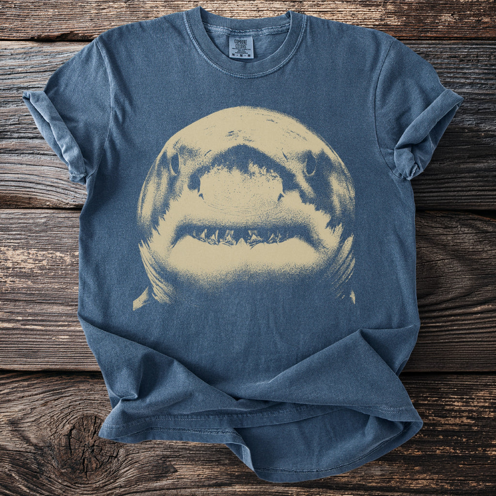 Blue Comfort Colors t-shirt with a close-up graphic of a shark's head and teeth.