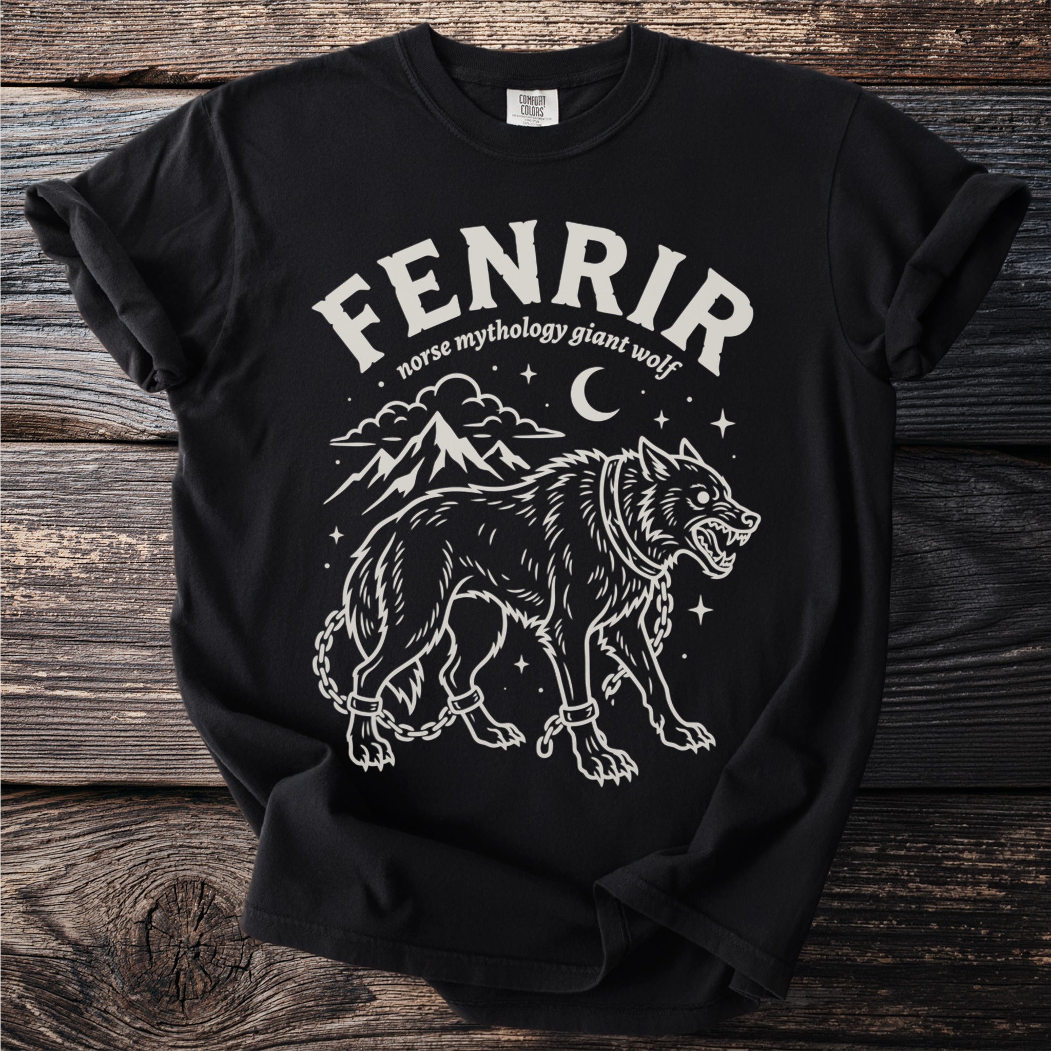 Black t-shirt with "Fenrir Norse mythology giant wolf" graphic and chained wolf.