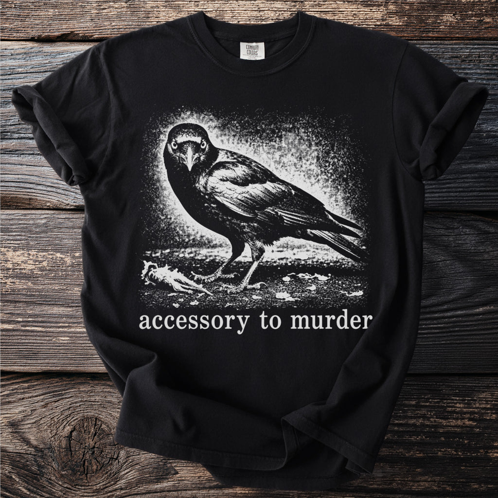 Black t-shirt with white crow graphic and "accessory to murder" text.