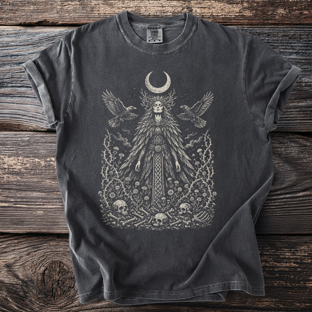 Dark t-shirt with mystical print of a crowned woman, moon, birds, and skulls.