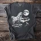 Dark t-shirt with white graphic of a capybara howling at the moon.