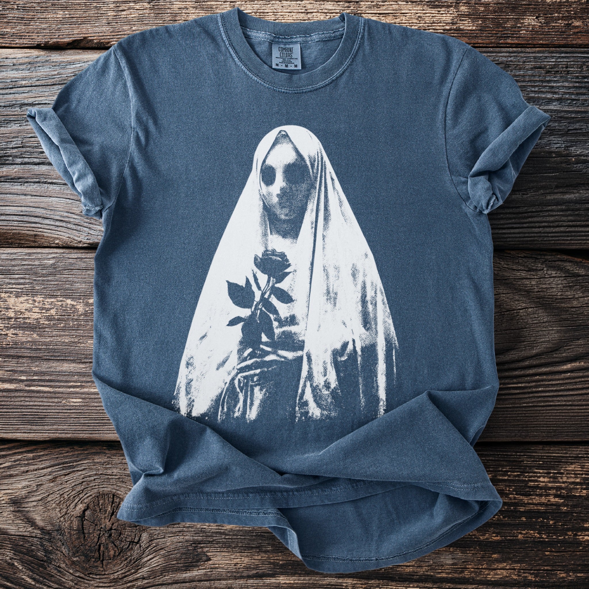 Navy t-shirt with white distressed print of a veiled figure holding a rose.