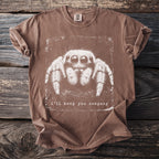 Brown t-shirt with a white graphic of a jumping spider and "i'll keep you company" text.