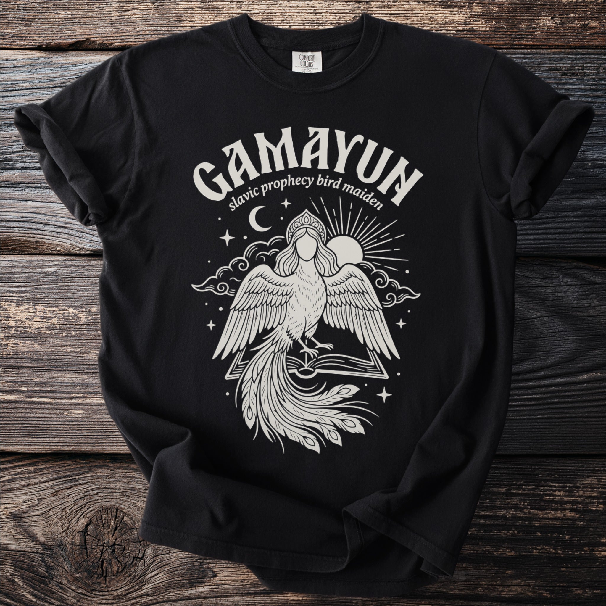 Black t-shirt with Gamayun Slavic prophecy bird maiden graphic.