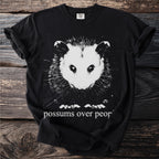 Black t-shirt with a graphic of an opossum and text "possums over people".