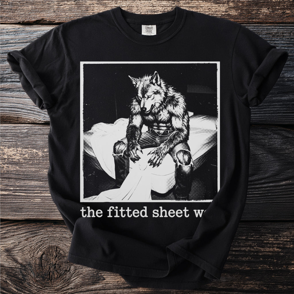 Black t-shirt with werewolf graphic and text "the fitted sheet w"
