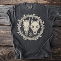 Pepper t-shirt with a horned animal skull and wolf skull inside a branch wreath.